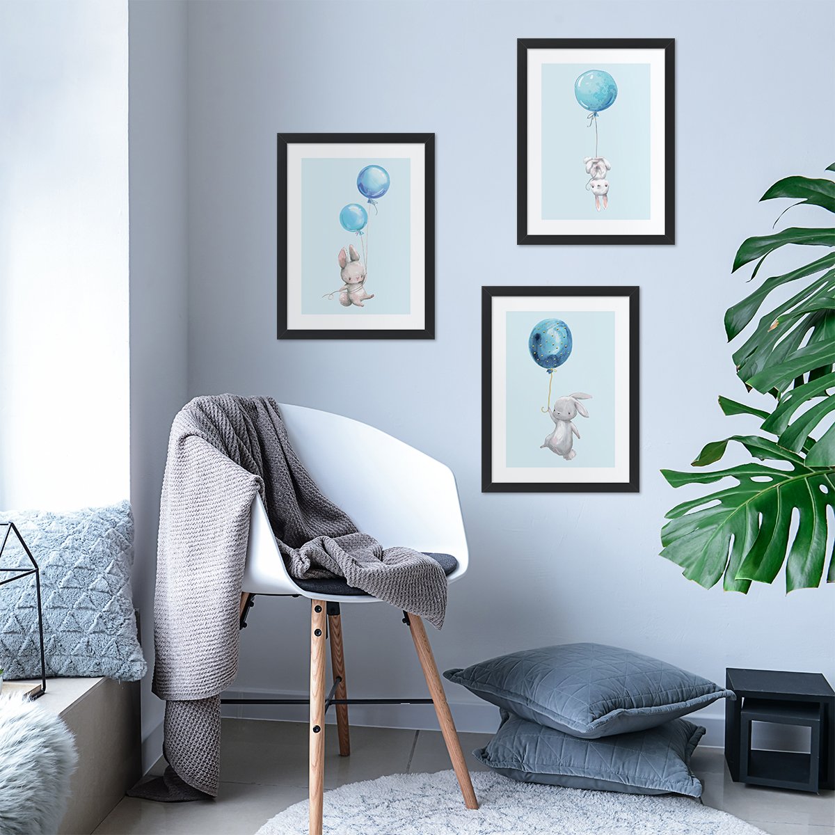Plakaty do pokoju dziecięcego z królikami lecącymi na niebieskich balonach w ramkach#kolor_niebieski
