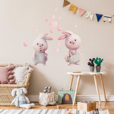 Naklejki na ścianę dla dziewczynki dwa słodkie króliki i różowe serca