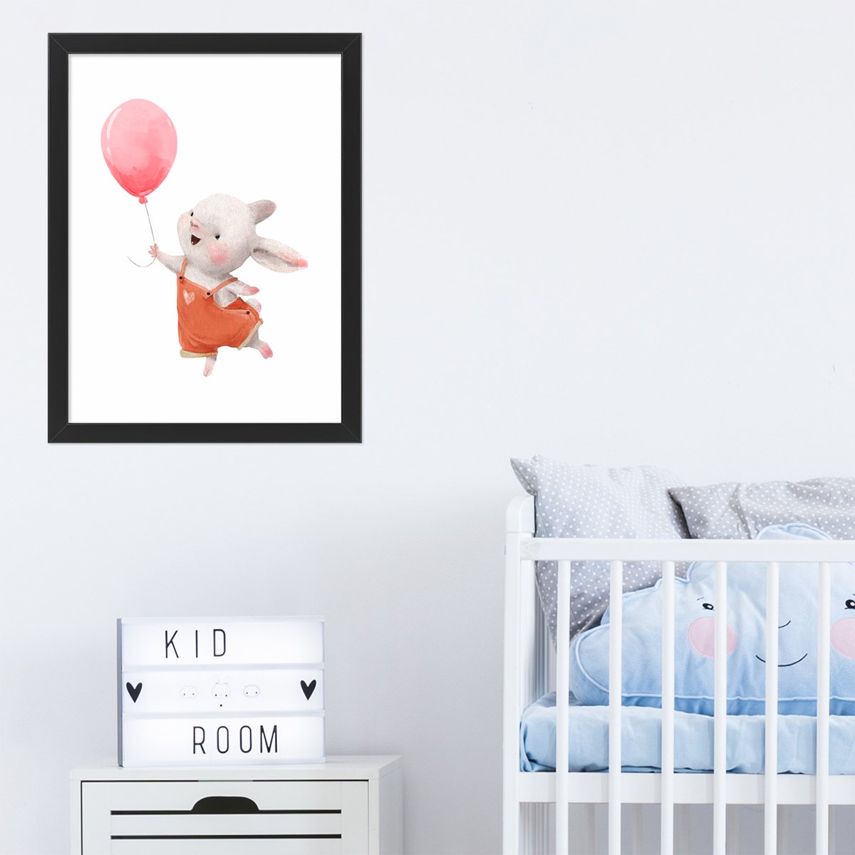 Plakat dla dzieci królik lecący z różowym balonem w czarnej ramie